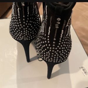 Guess open toes boots.